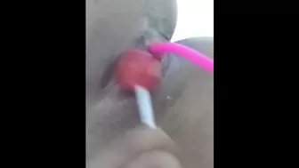 Attractive Latin Teeny doing a Fine Striptease and Fucking her Cunt with Lollipop