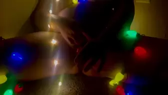 Xxxmas Wrapping herself up in Christmas Lights and Fucking herself with a Candy Cane
