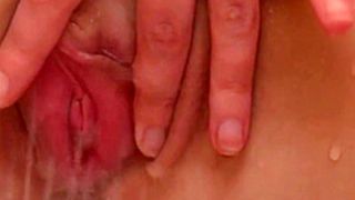 Sarah Kimble rubbing her Snatch Shower