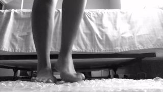 Latina Teen Pops Bubble Wrap with Beautiful Feet