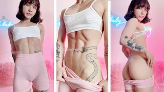 Sexy and skinny Oriental muscle slut flexes and flashes her titties and vagina