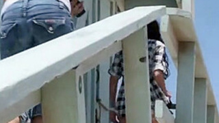 April O'Neal flashes at the beach - Devineones