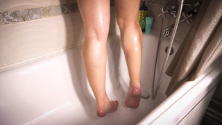 Youngster Homemade Teasing Her Attractive Calves In The Shower