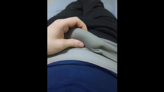 The stud rubs his penis and jerks off with a rubber band from his panties