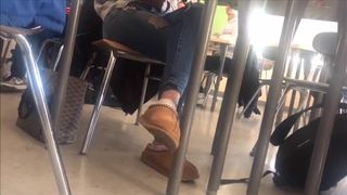 Beautiful Girl Plays with Shoes in Class